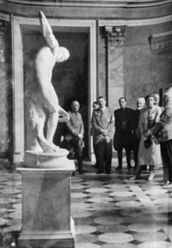 Adolf Hitler presents Myron's Discobolus, which he just purchased, in Munich's Glyptothek